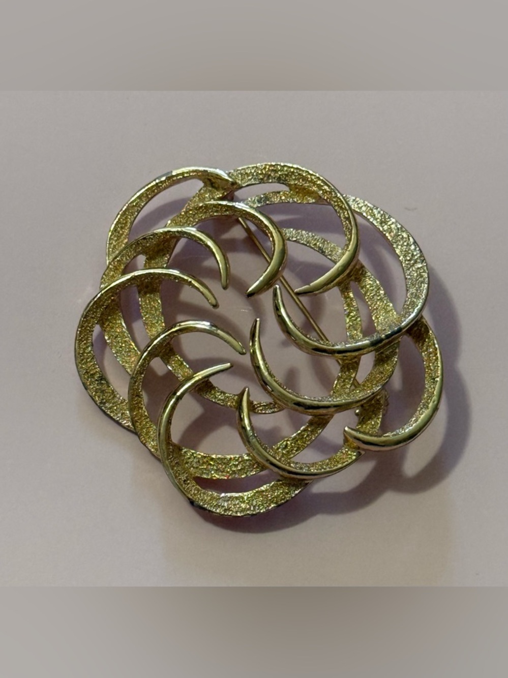 Classic Gold-Tone Spiral Circle Brooch